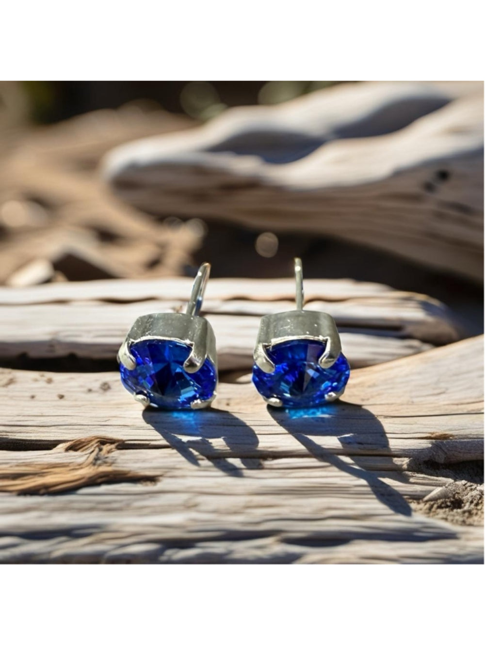 Handcrafted earrings with Swarovski crystal in blue sapphire