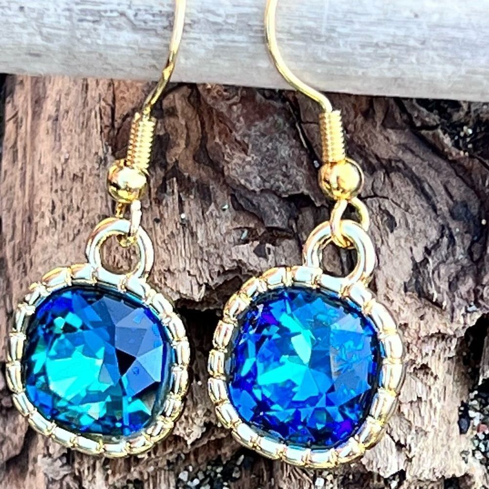 Earrings made with Bermuda Blue Swarovski crystal and gold earwires handcrafted
