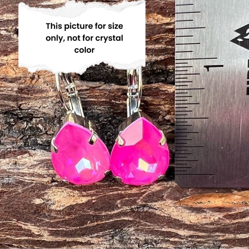 Earrings with reddish/pinkish Swarovski crystal