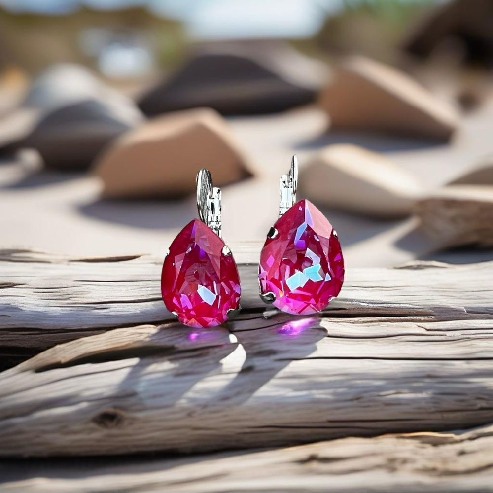 Earrings with reddish/pinkish Swarovski crystal