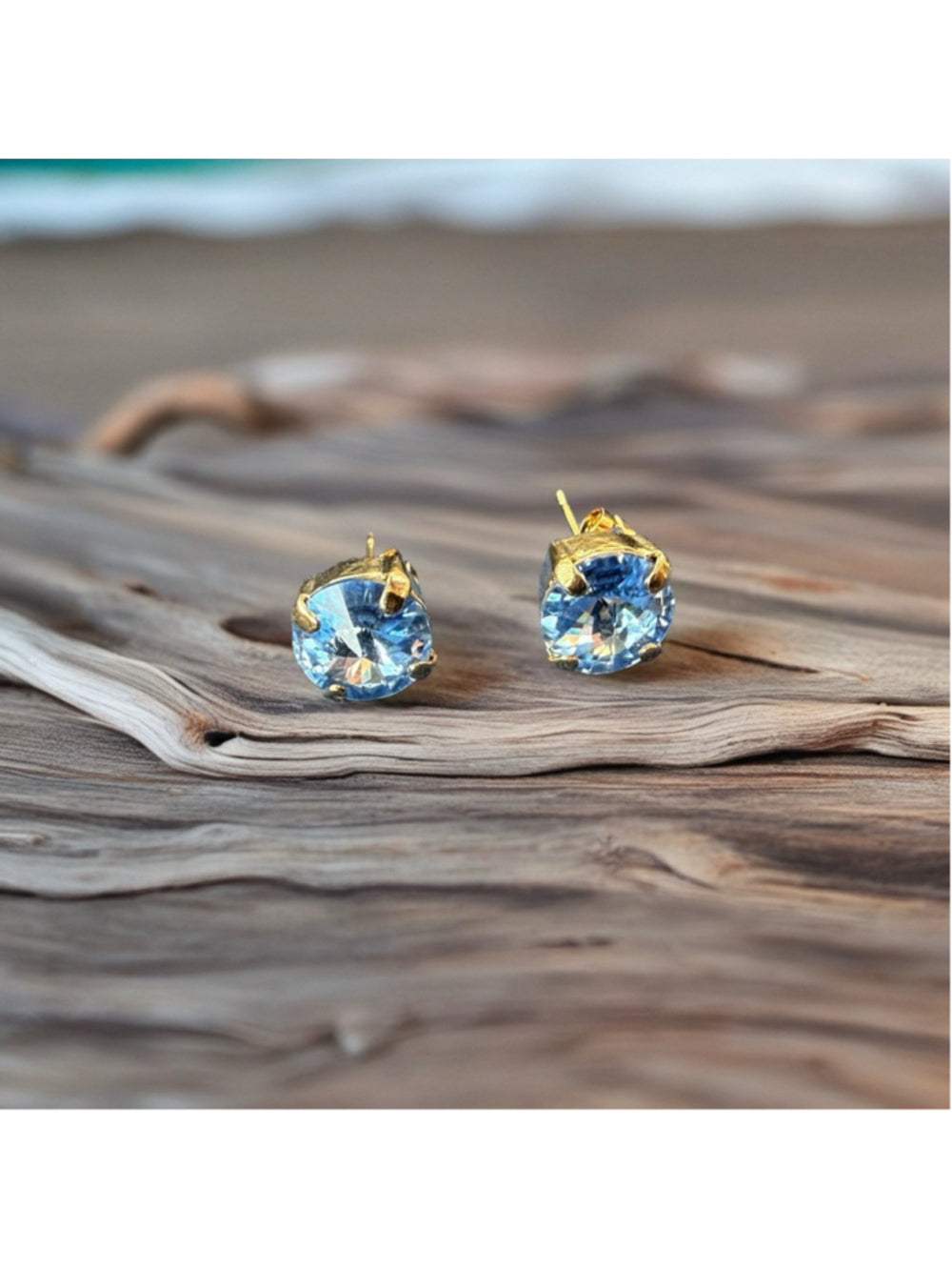 Handcrafted petite stud earrings with sparkly light sapphire Swarovski crystals