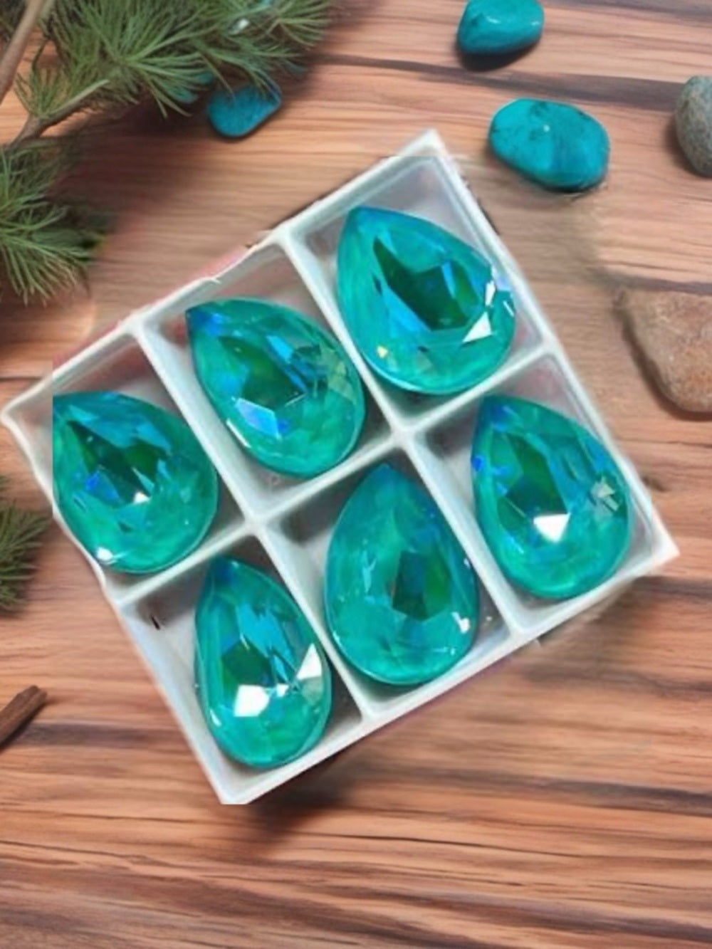 Handcrafted earrings with laguna blue teardrop Swarovski crystal