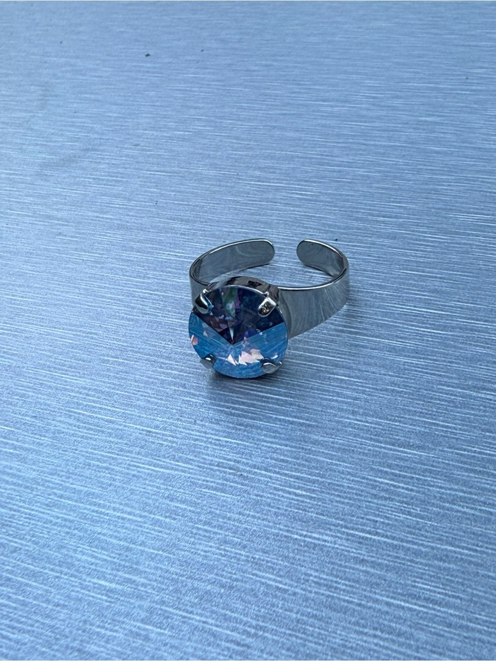 Handcrafted ring made with Swarovski light sapphire shimmer crystal adjustable