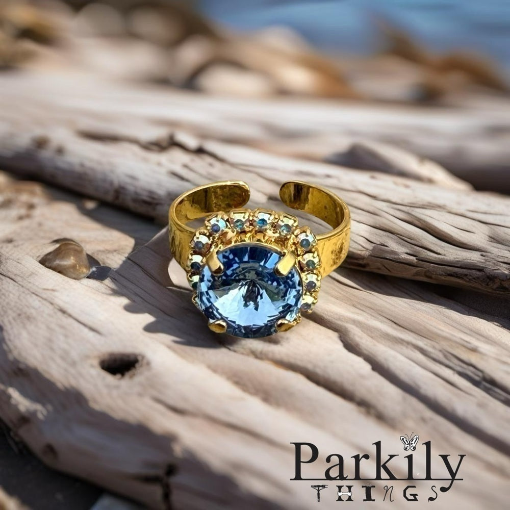 Handcrafted ring made with light sapphire Swarovski crystal size adjustable