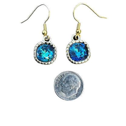Earrings made with Bermuda Blue Swarovski crystal and gold earwires handcrafted
