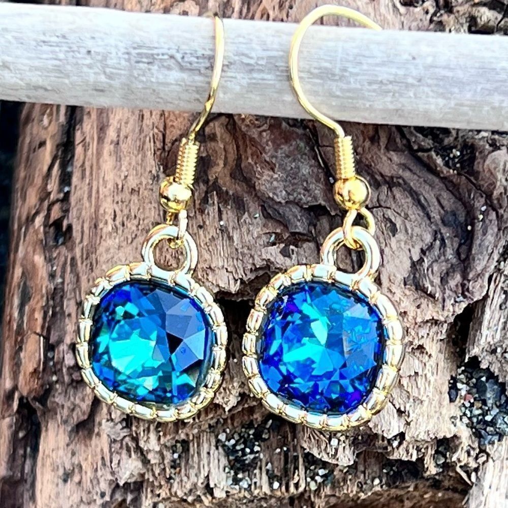 Earrings made with Bermuda Blue Swarovski crystal and gold earwires handcrafted