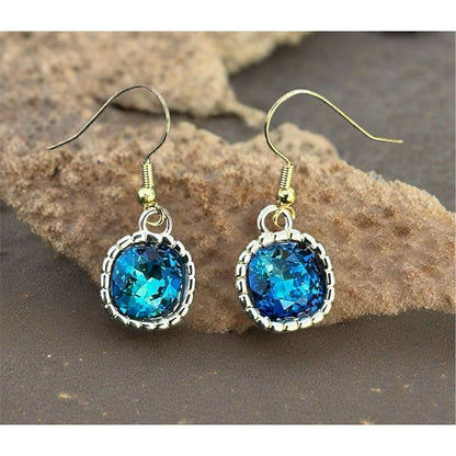 Earrings made with Bermuda Blue Swarovski crystal and gold earwires handcrafted