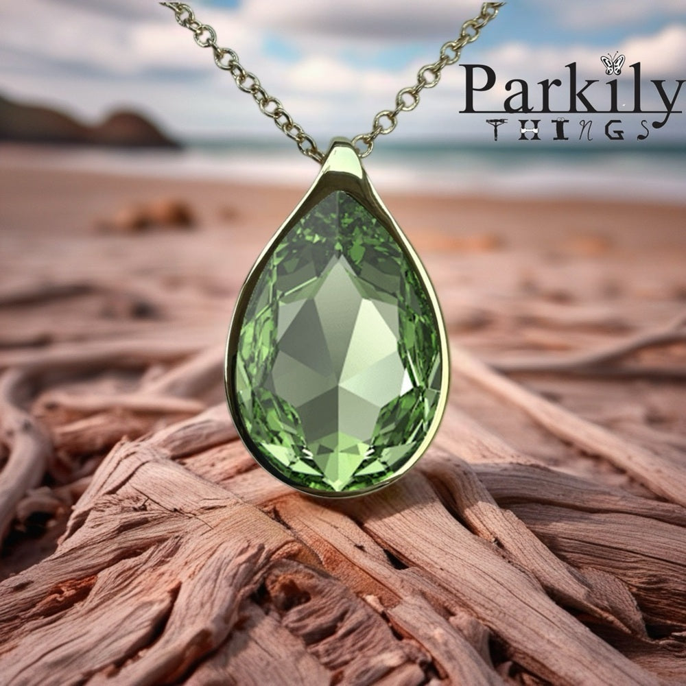 Handcrafted necklace with green peridot crystal and chain