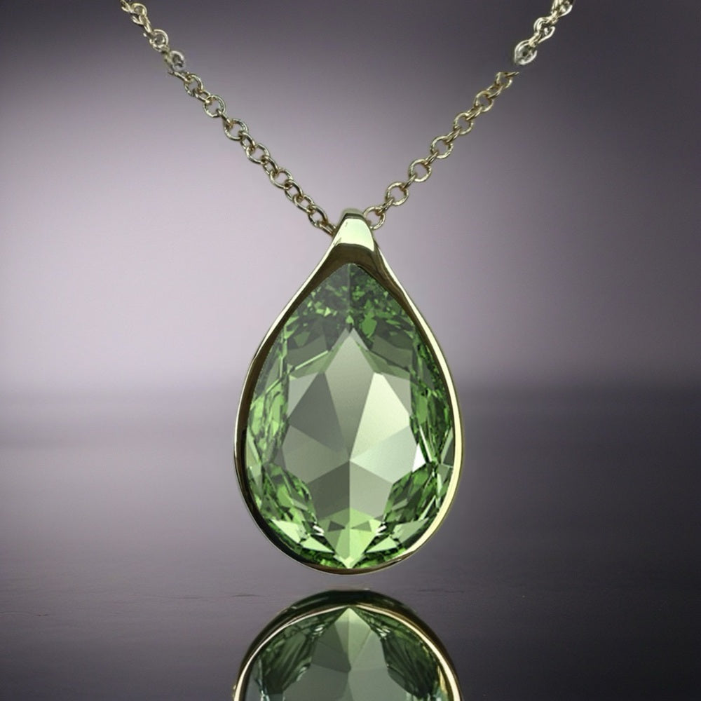 Handcrafted necklace with green peridot crystal and chain