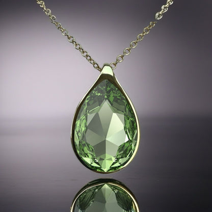 Handcrafted necklace with green peridot crystal and chain