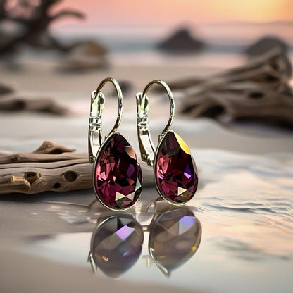 Handcrafted earrings with a purple amethyst teardrop Swarovski crystal