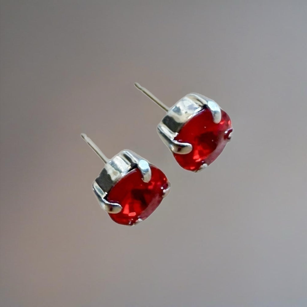Handcrafted earrings with a red Swarovski crystal