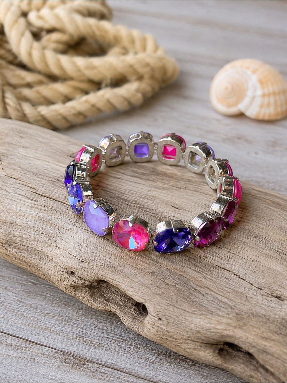 Handcrafted statement bracelet with Swarovski crystal pinks and purples