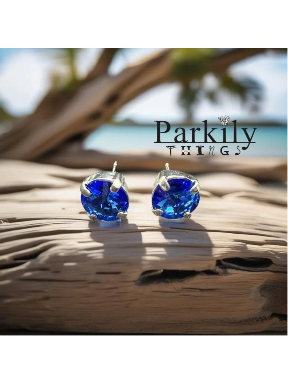 Handcrafted earrings with Swarovski crystal in blue sapphire