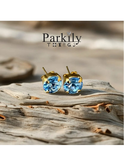 Handcrafted petite stud earrings with sparkly light sapphire Swarovski crystals