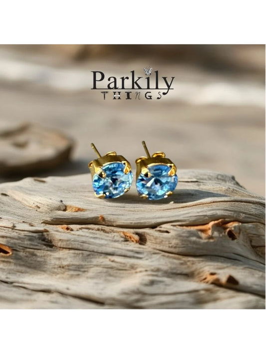 Handcrafted petite stud earrings with sparkly light sapphire Swarovski crystals