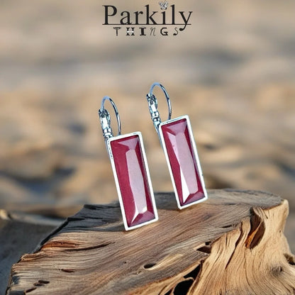 Handcrafted earrings with Austrian deep red coral color baguette crystal
