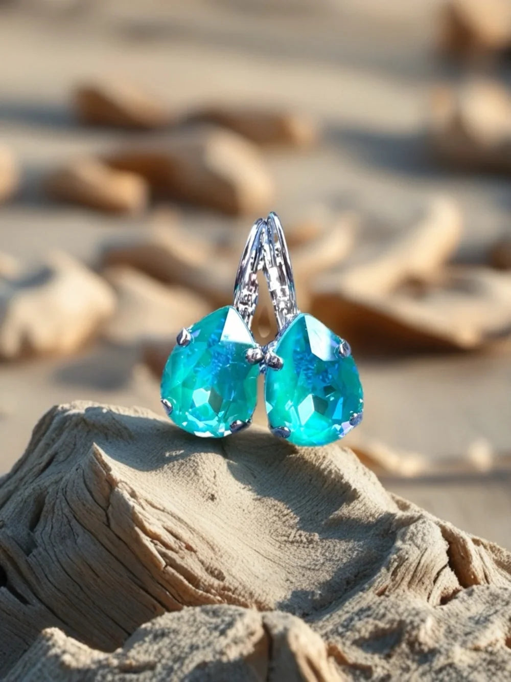 Handcrafted earrings with laguna blue teardrop Swarovski crystal