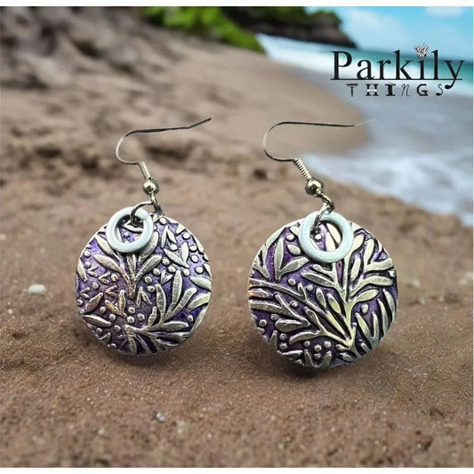 Patina pierced earrings with silver and purple pattern