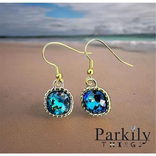 Earrings made with Bermuda Blue Swarovski crystal and gold earwires handcrafted