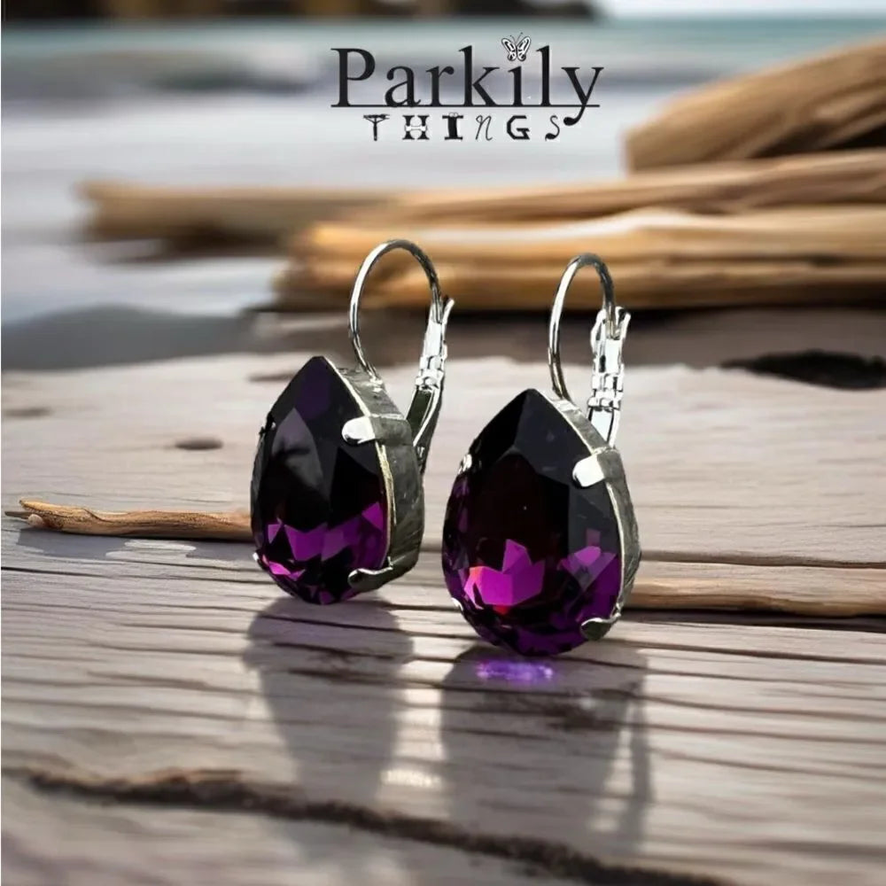Handcrafted earrings with a purple amethyst teardrop Swarovski crystal
