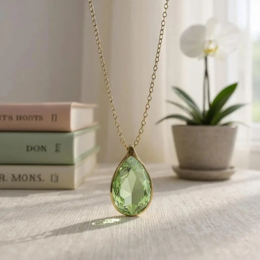 Handcrafted necklace with green peridot crystal and chain