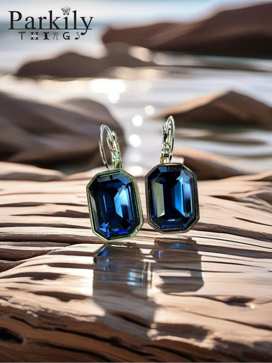 Handcrafted earrings with sparkly Montana blue octagon Austrian crystal