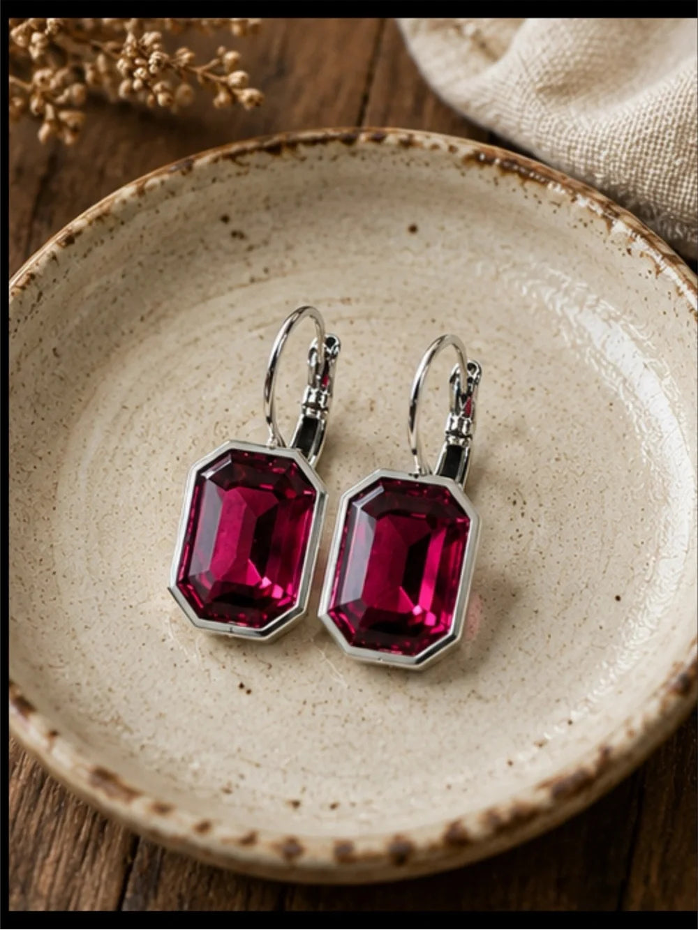 Handcrafted earrings with sparkly fuchsia octagon Austrian crystal